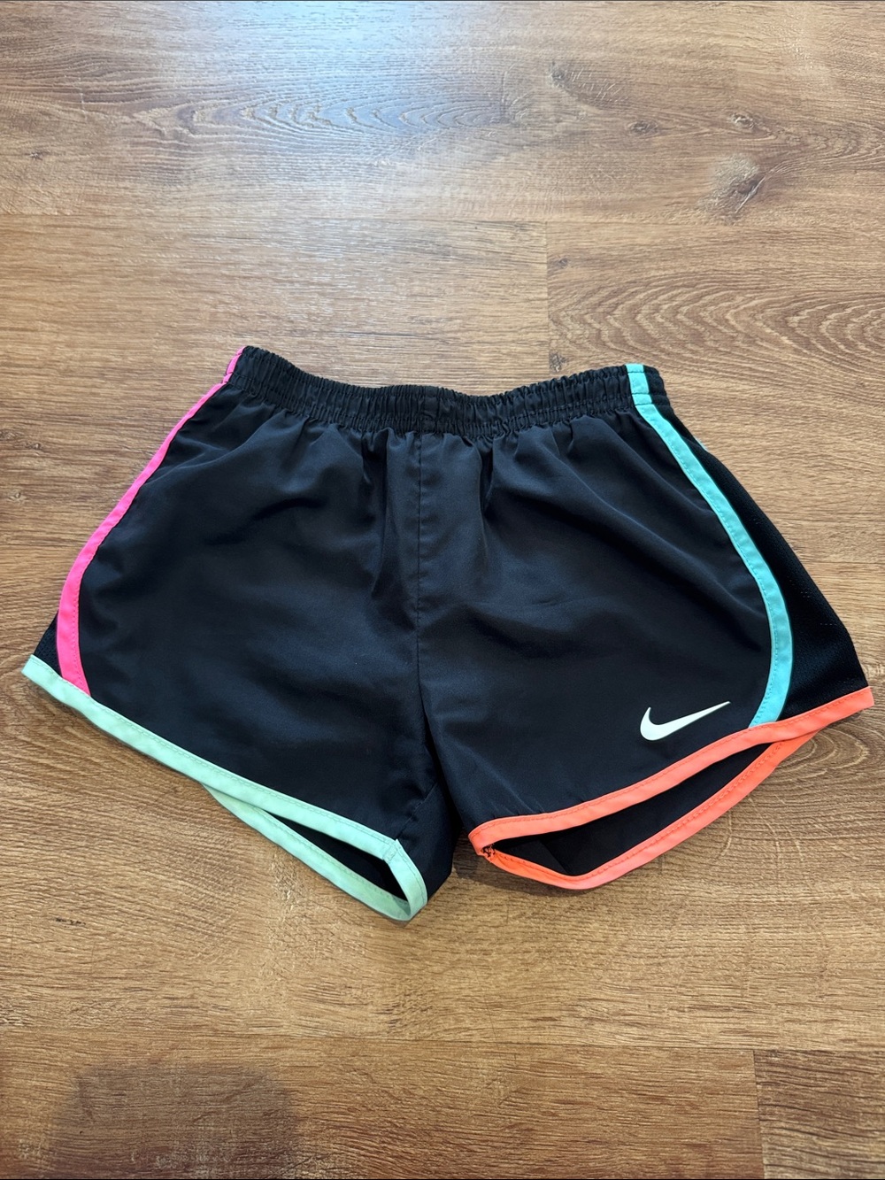 Nike girls Black Athletic Shorts with Mint, Coral & Pink Trim (6-7)